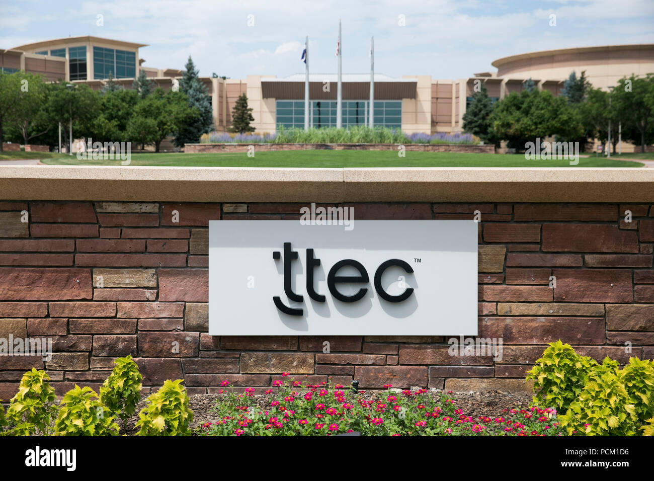A logo sign outside of the headquarters of TTEC in Englewood, Colorado