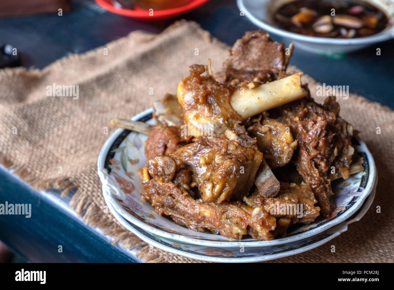 tengkleng. goat meat with ribs and bone cooked with soup Stock Photo