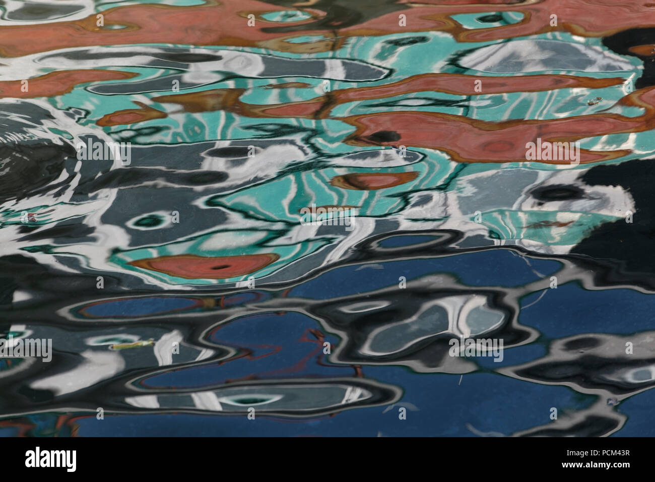 Abstract reflection of boats in water Stock Photo - Alamy