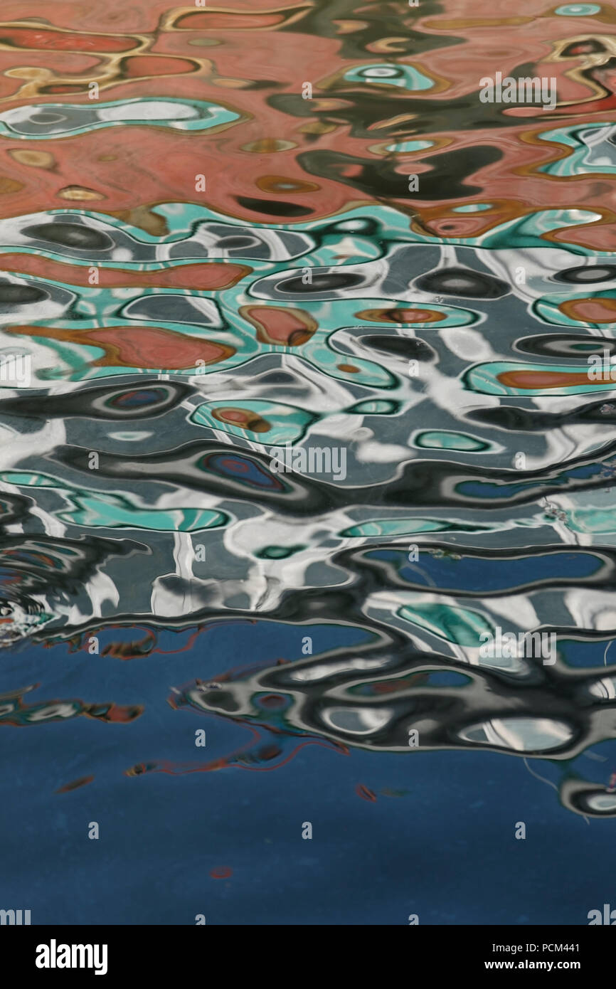 Abstract reflection of boats in water Stock Photo - Alamy