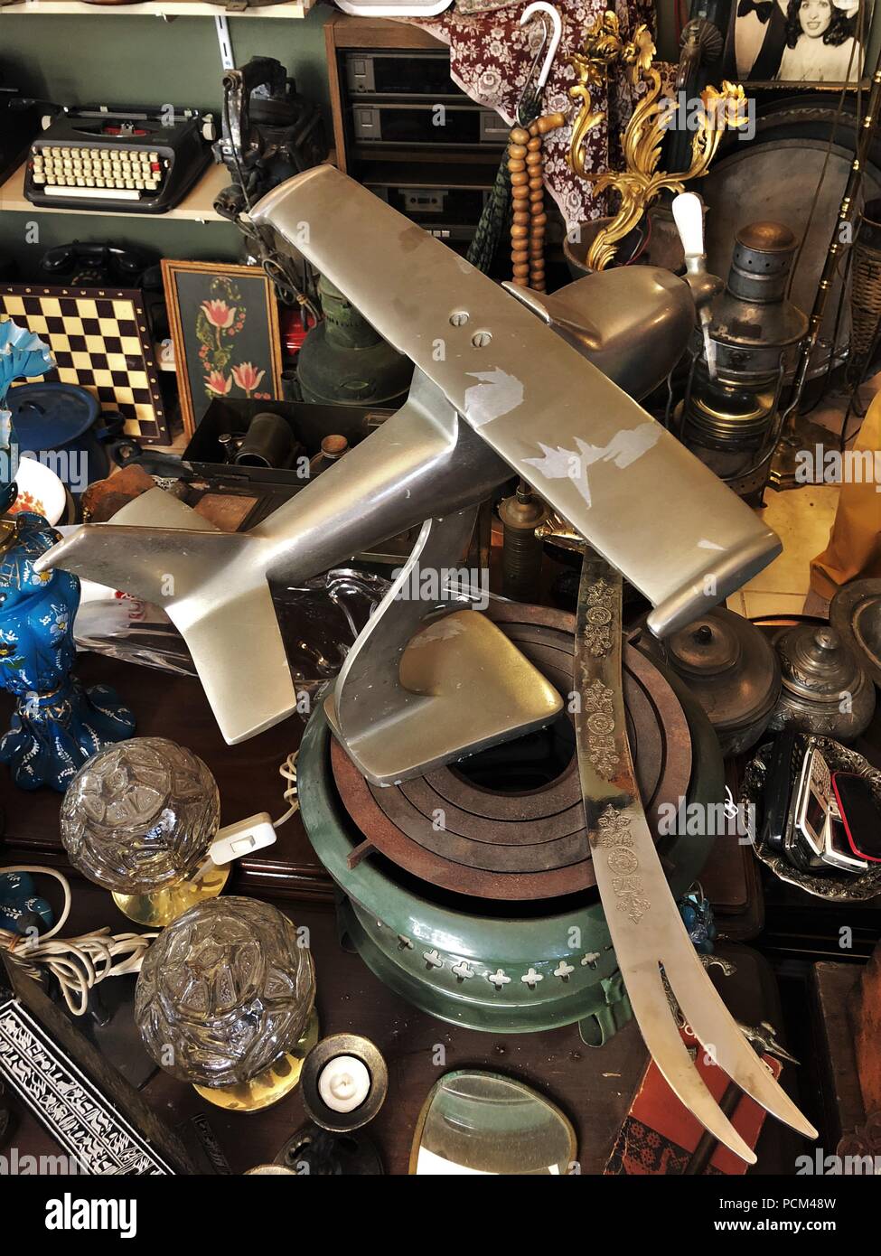 Vintage metal airplane icon in an antique shop in Balat Stock Photo