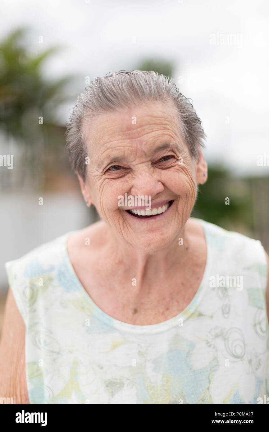 Portrait of a happy grandma Portrait of a smiling elderly woman Stock Portrait of a happy grandma Portrait of a smiling elderly woman Stock