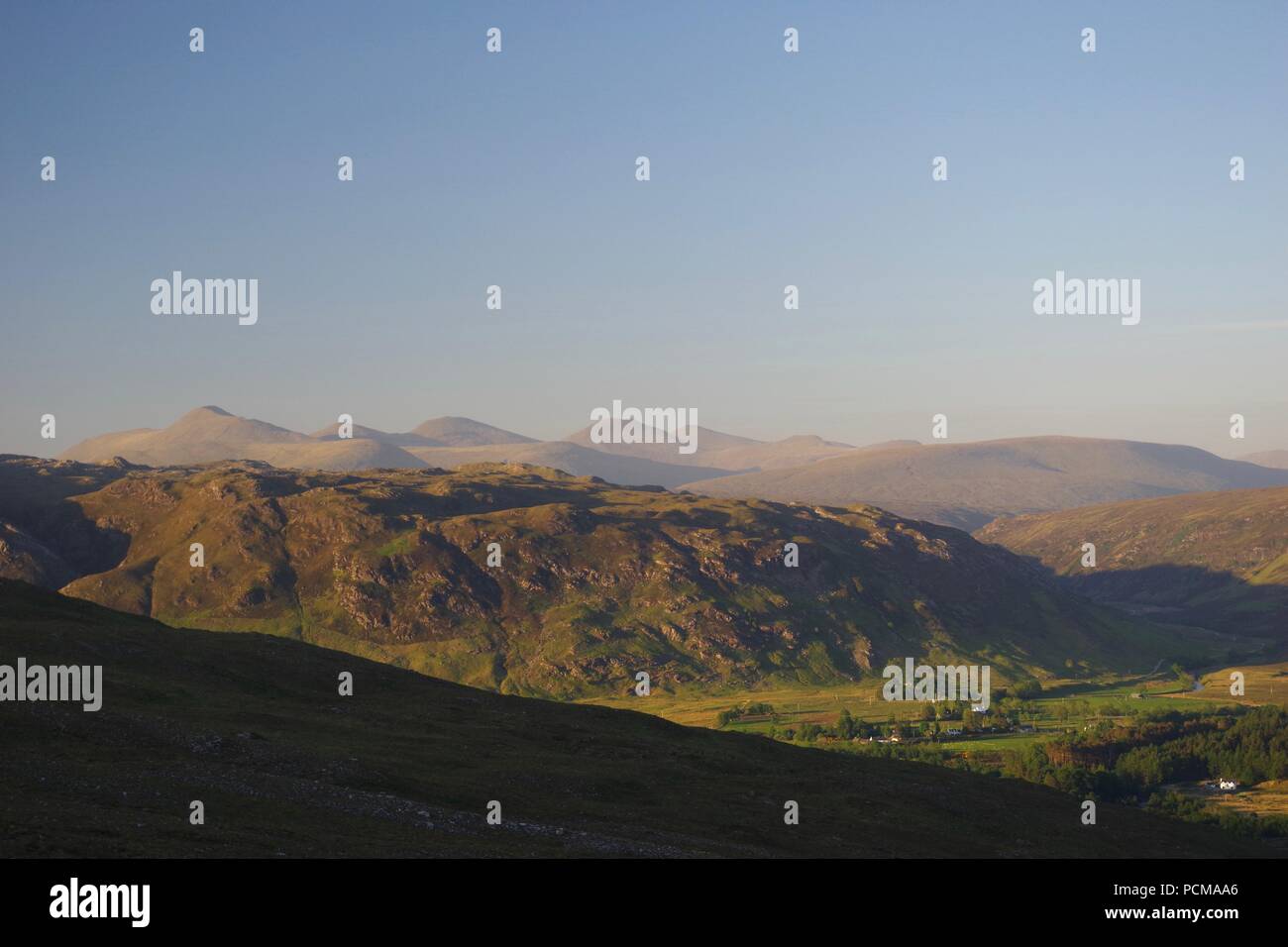 Uird Beinn a'Mhuinidh and Scottish Peaks beyond Kinlochewe in the Golden ...