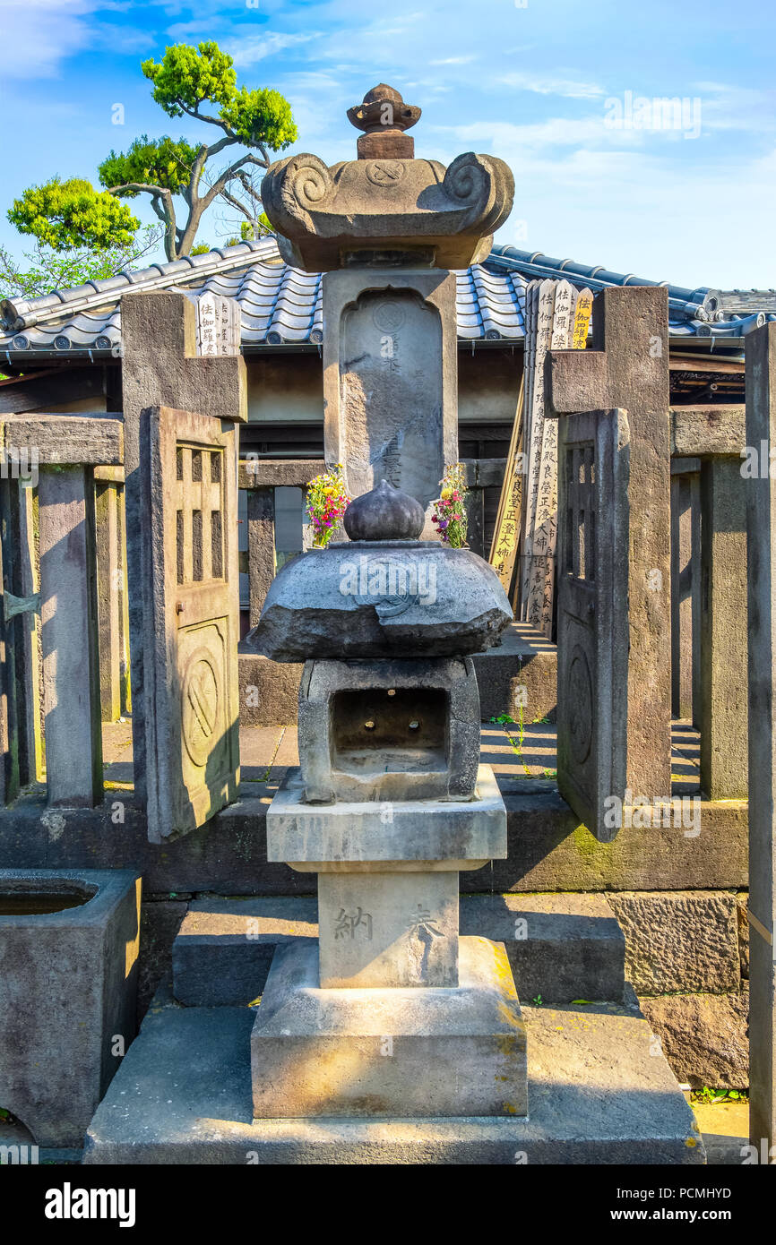 TOKYO, JAPAN - APRIL 20 2018: Grave of lady Ako master of 47 ronin, loyal masterless samurai, one of the most popular Japanese historical epic legends Stock Photo