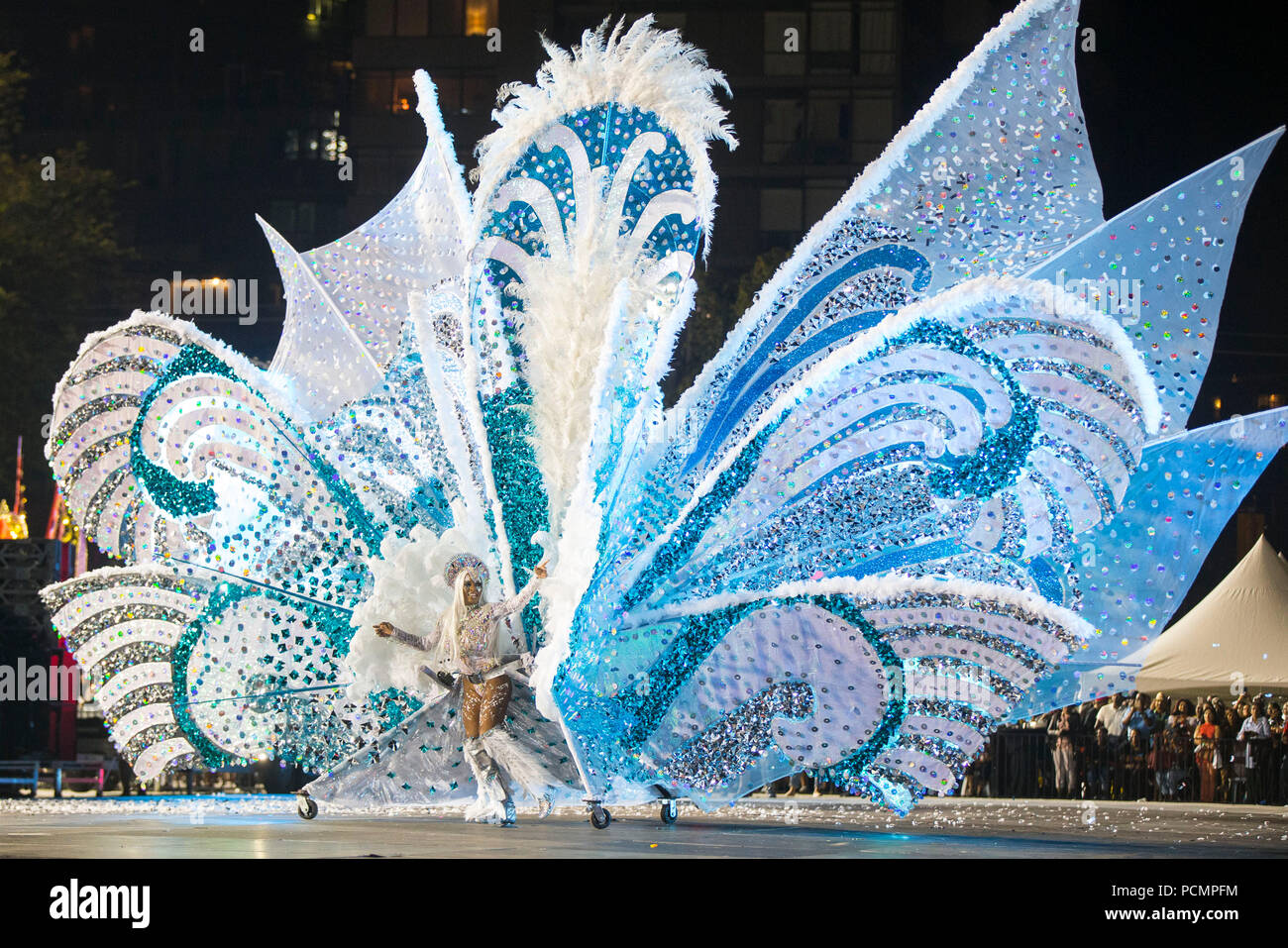 Toronto, Canada. 2nd Aug, 2018. A dressed up competitor performs with her float during the King and Queen Competition of the 2018 Peeks Toronto Caribbean Carnival in Toronto, Canada, Aug. 2, 2018. Dozens of talented masqueraders with their extravagant costumes took part in this annual event on Thursday to compete for the King and Queen of the Carnival. Credit: Zou Zheng/Xinhua/Alamy Live News Stock Photo