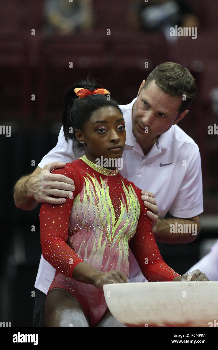 July 28, 2018: Gymnast Simone Biles with coach Laurent Landi during the  2018 GK U.S. Classic gymnastics championships, held in Columbus, OH. This  was Biles' first competition since she won four gold