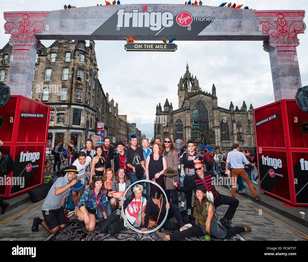 Edinburgh, Scotland, UK; 3 August, 2018. Official Opening of the new Virgin Money Fringe Street Events on the Royal Mile in Edinburgh. Performers and Shona McCarthy Chief Executive of the Edinburgh Fringe Society gather to cut the red ribbon and open this year's Fringe Festival. Credit: Iain Masterton/Alamy Live News Stock Photo