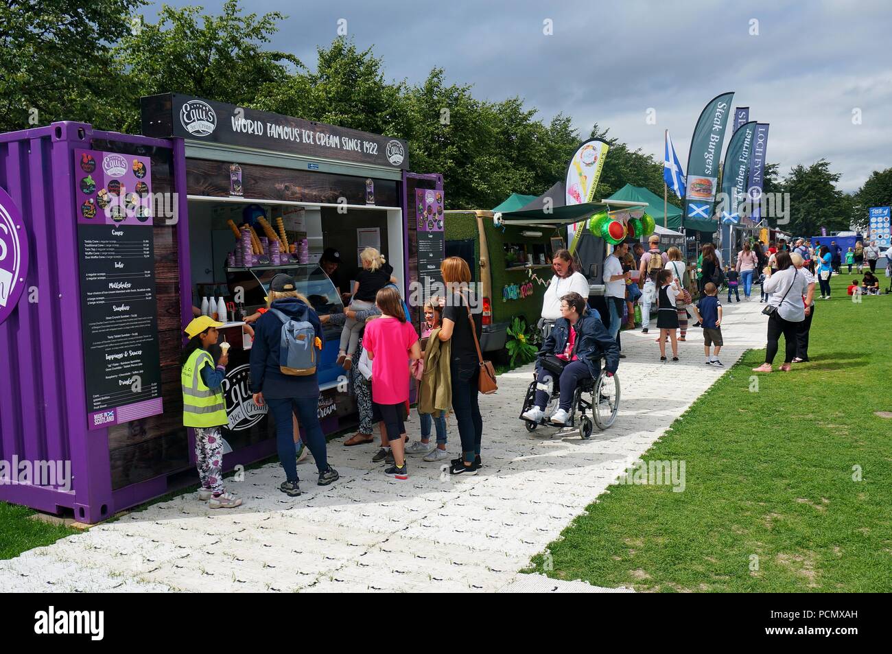 Glasgow, UK, 3rd July 2018,  Despite mixed weather people of Glasgow and tousands of tourists enjoy many events organised around in and around Glasgow ( Green park pictured) associated with the first European Championships 2018. Credit: Pawel Pietraszewski / Alamy Live News Stock Photo