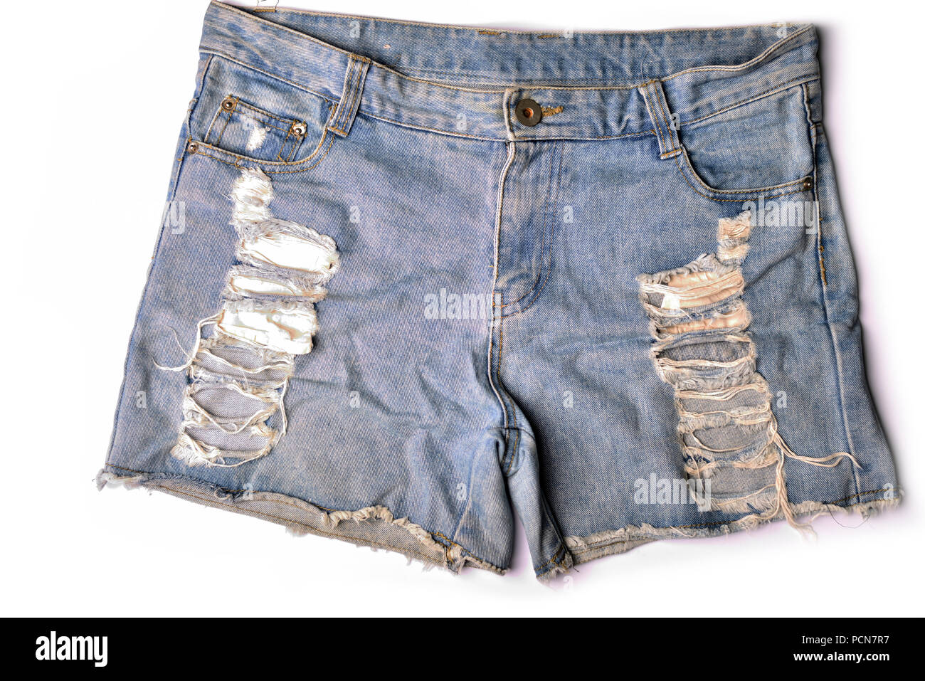 Blue denim shorts on white background. Stock Photo
