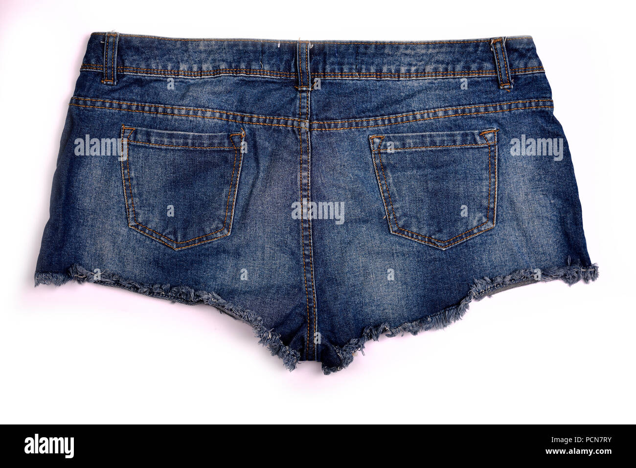 Blue denim shorts on white background. Stock Photo