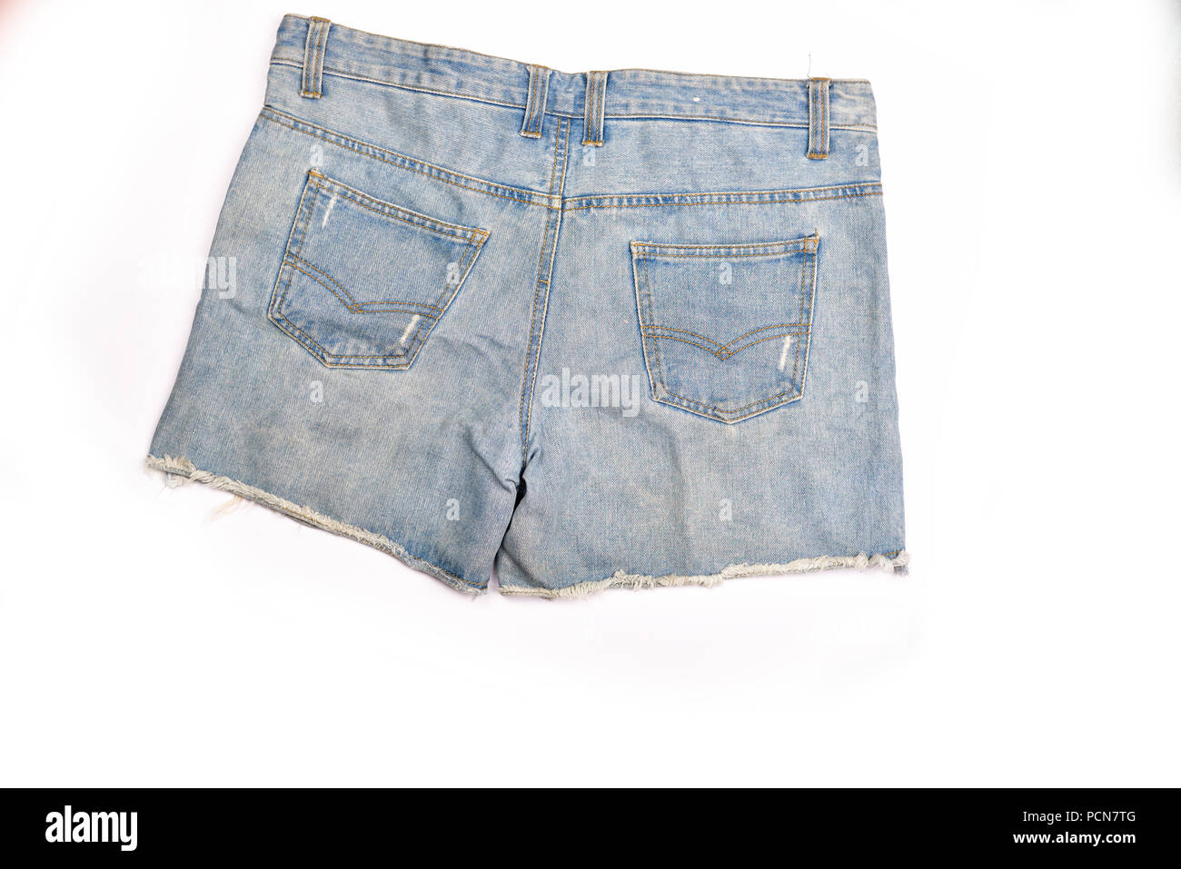 Blue denim shorts on white background Stock Photo - Alamy