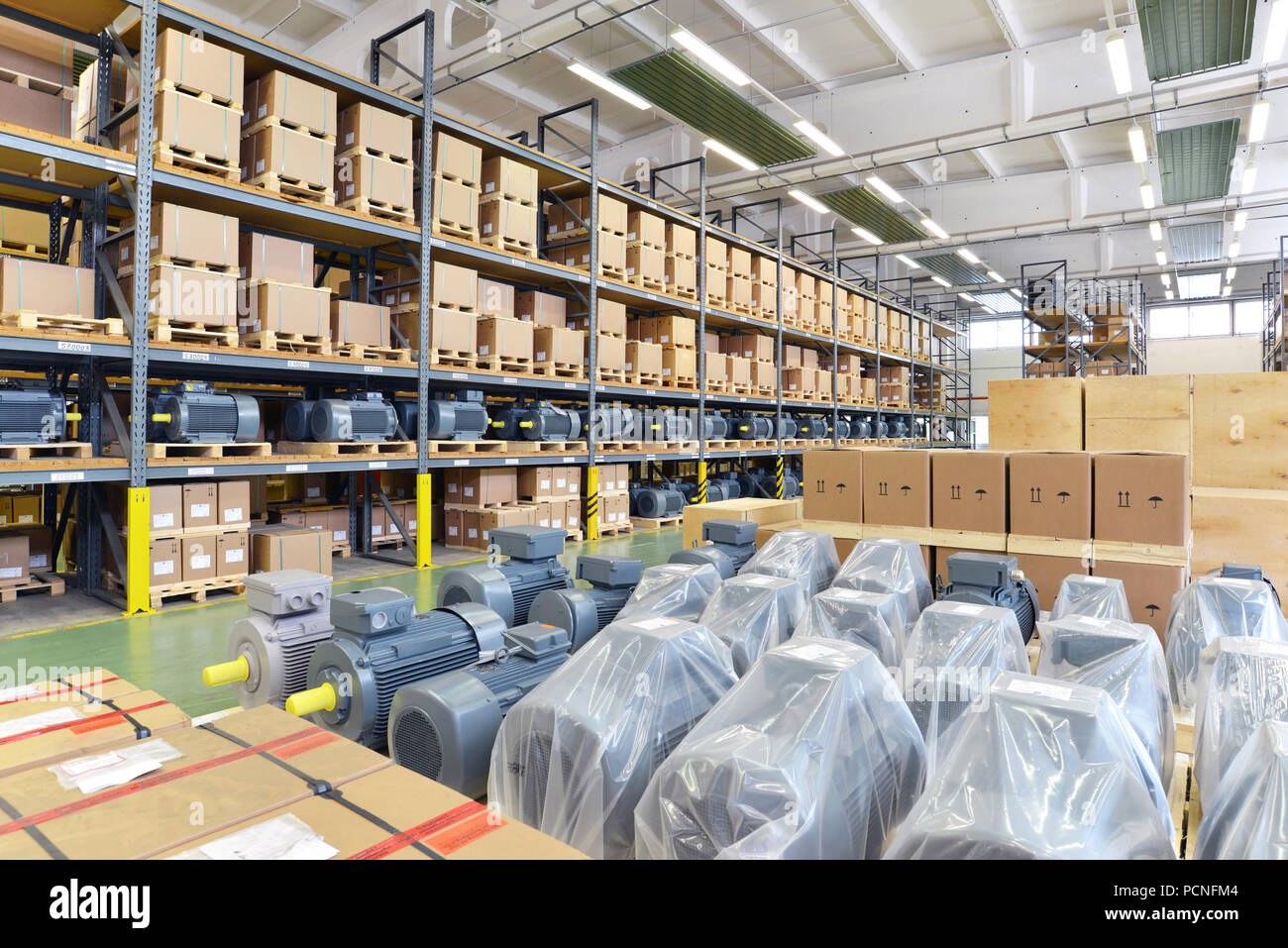 warehouses with shelves full of goods in an industrial company ...