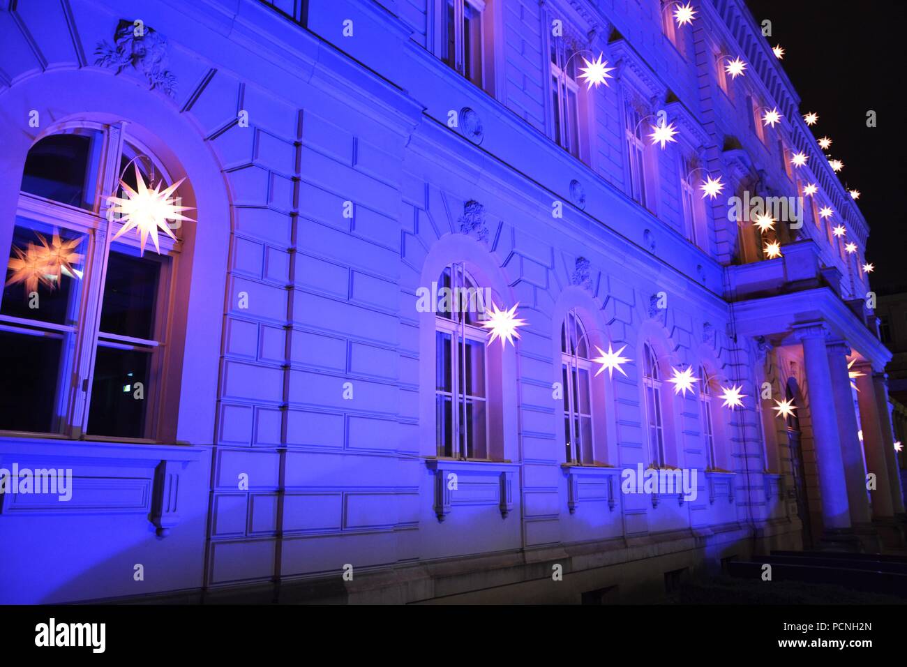 Alte Kommandantur building illuminated at night Stock Photo - Alamy