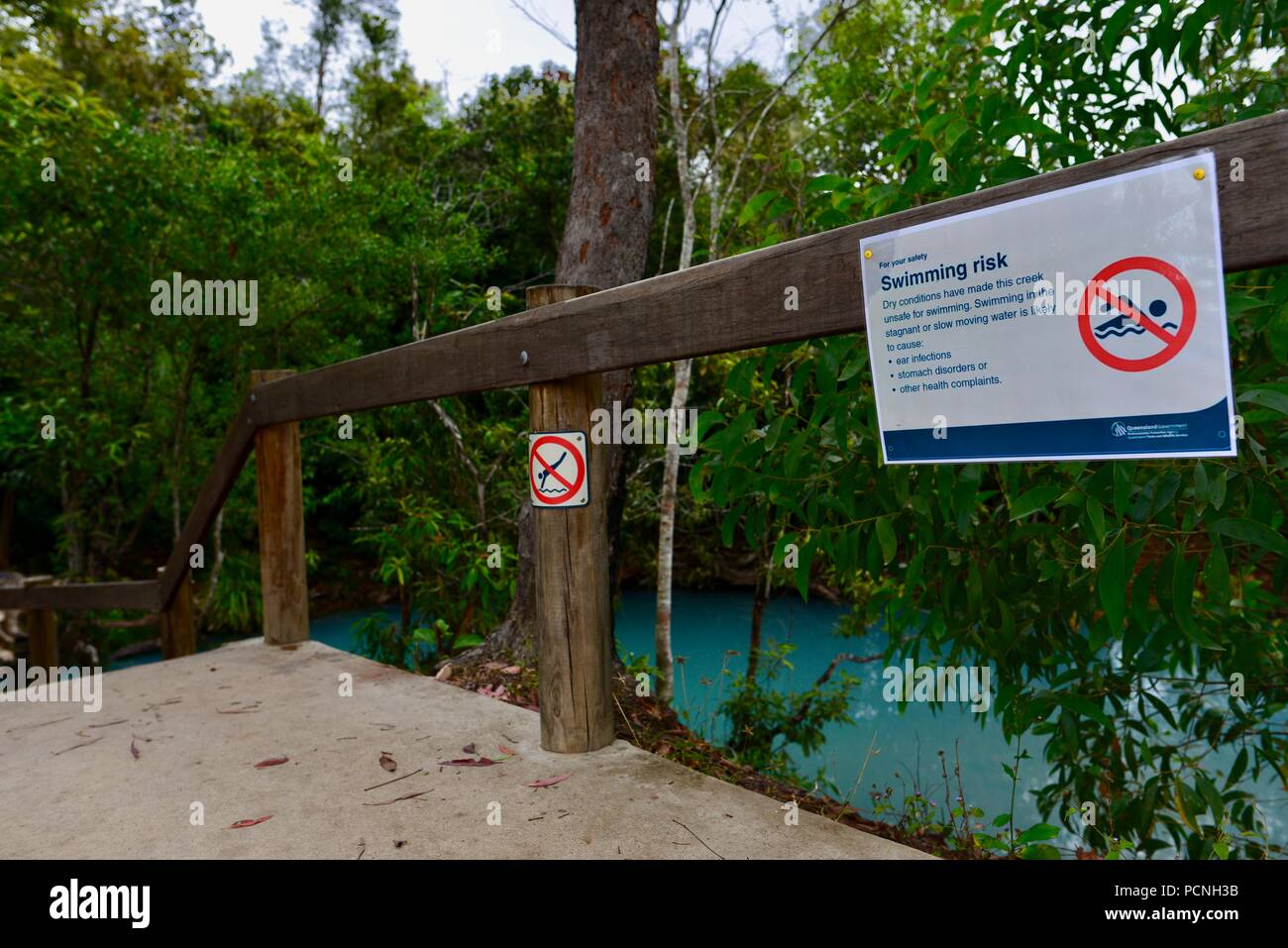 No swimming swimming risk sign, Cardwell Spa Pool, Cardwell, Queensland, Australia Stock Photo