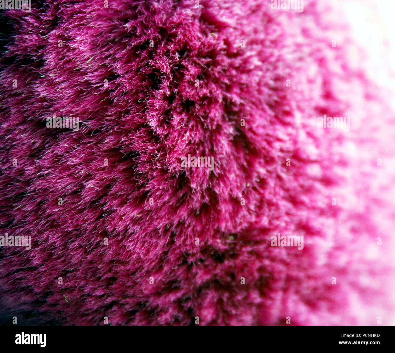 Pink color wool detail texture macro zoom Stock Photo