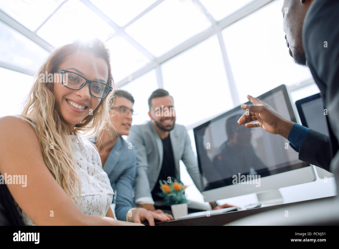 successful business team in the workplace Stock Photo - Alamy