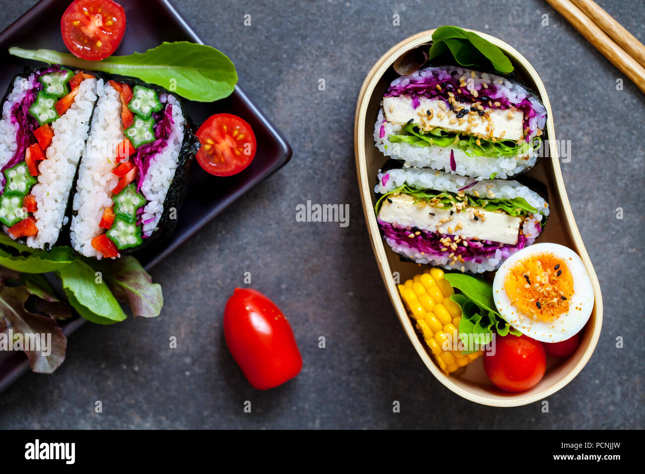 Japanese bento box with tofu onigirazu Stock Photo Alamy