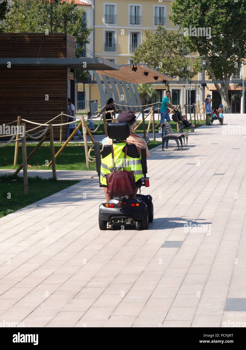 Covered mobility scooter hi-res stock photography and images - Alamy