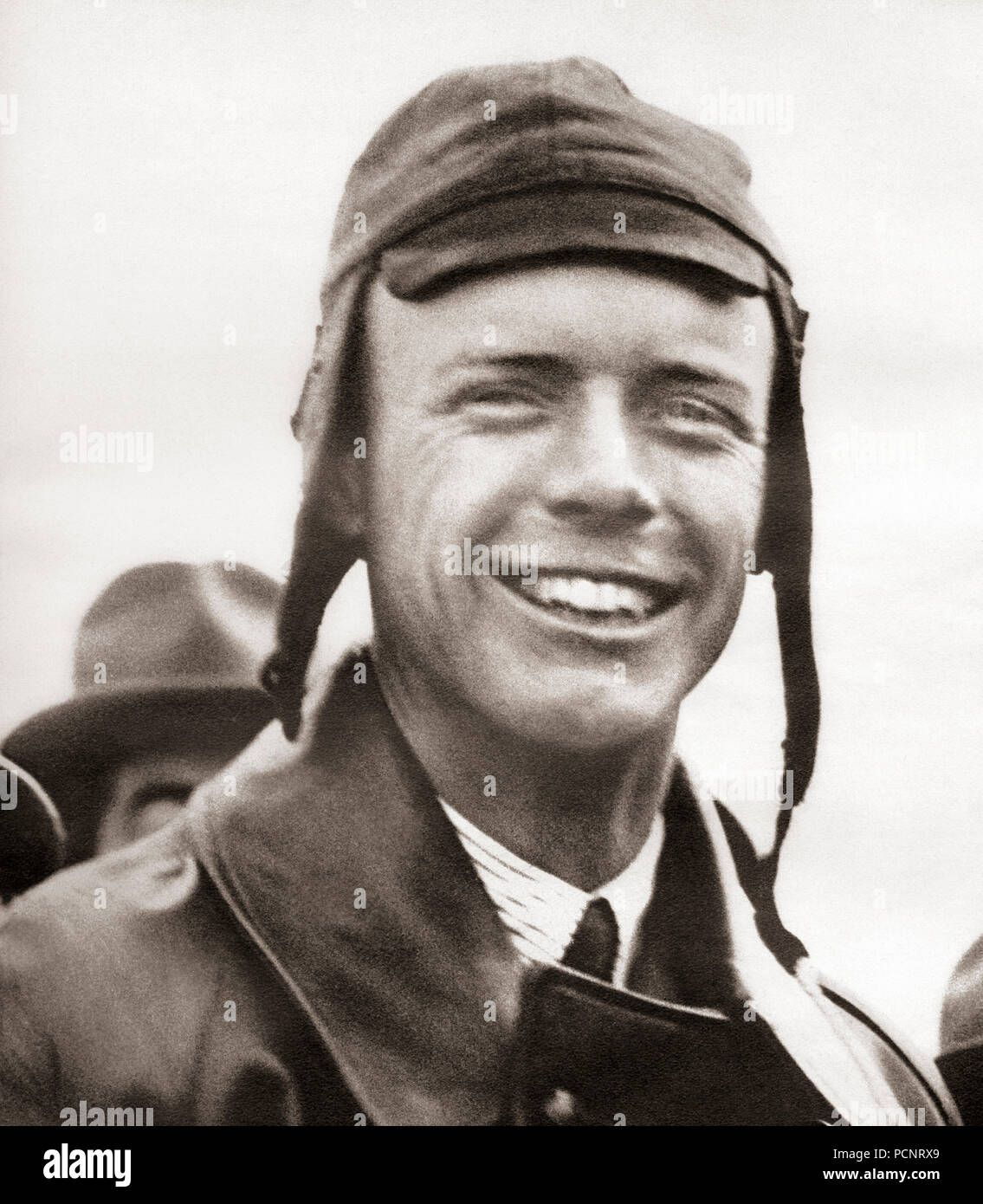 Charles Augustus Lindbergh, 1902 – 1974, nicknamed Lucky Lindy, The Lone Eagle, and Slim.  American aviator, military officer, author, inventor, explorer, and environmental activist.  From These Tremendous Years, published 1938. Stock Photo