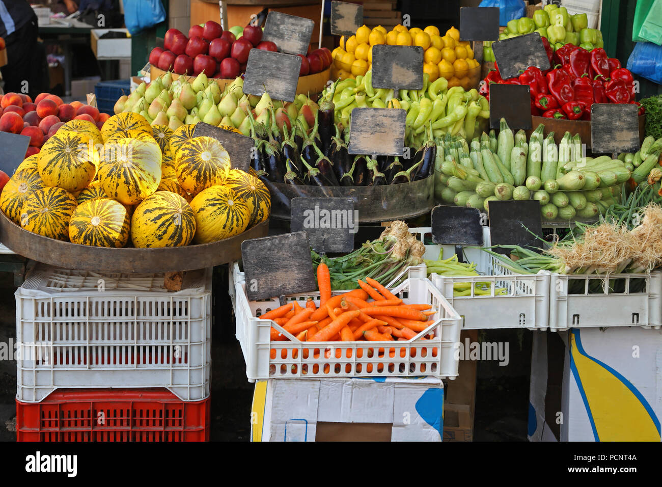 Variety of organic fruits and vegetables sold on market stall Stock ...