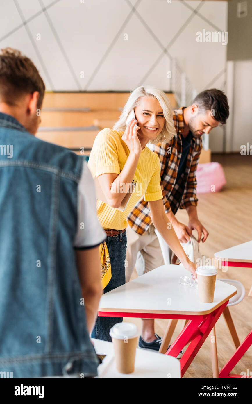 happy young students spending time together at lecture room of university Stock Photo