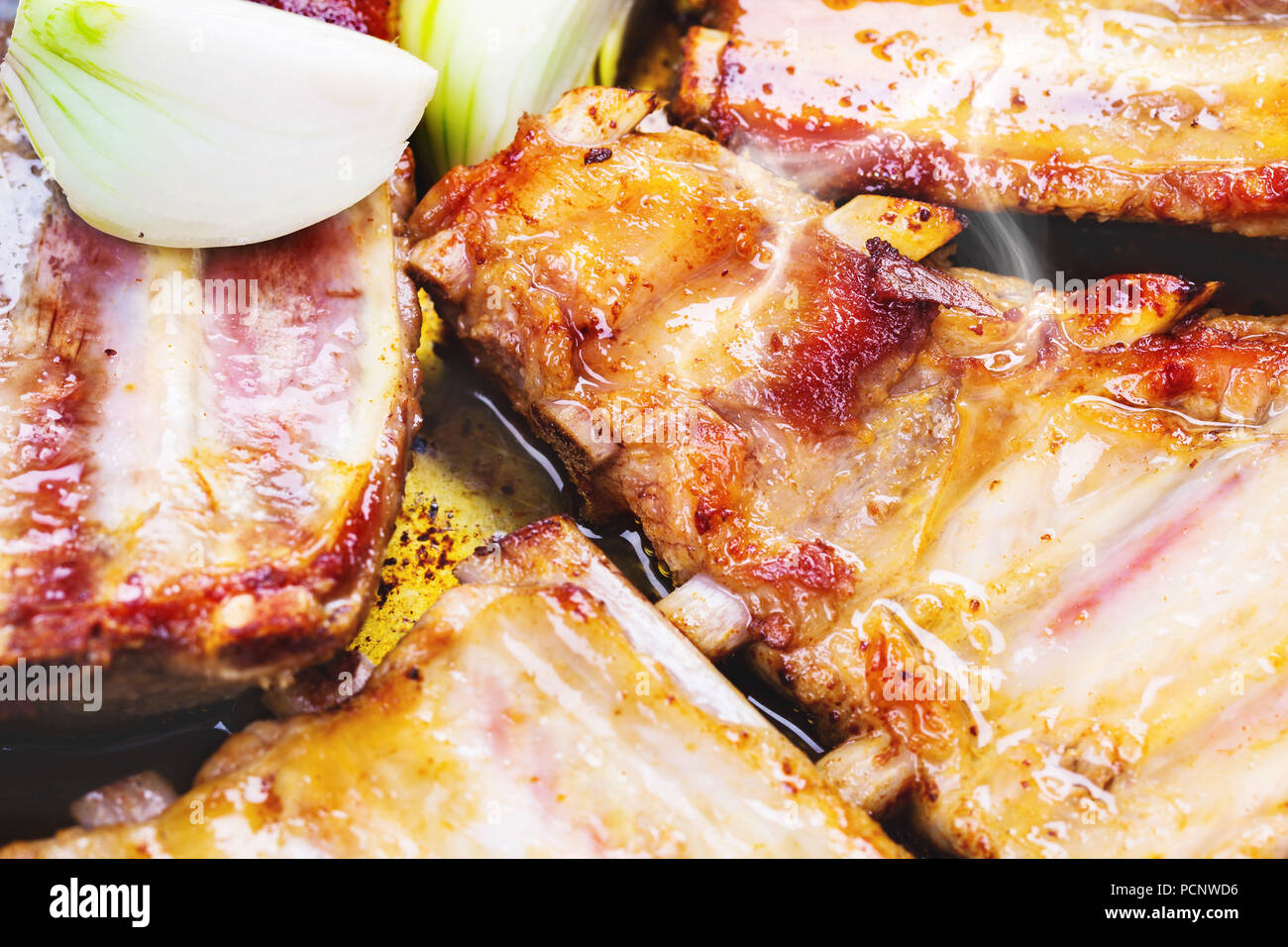 Spare ribs are fried in the pan hires stock photography and images Alamy