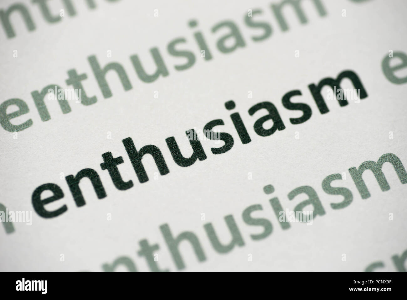 word enthusiasm printed on white paper macro Stock Photo