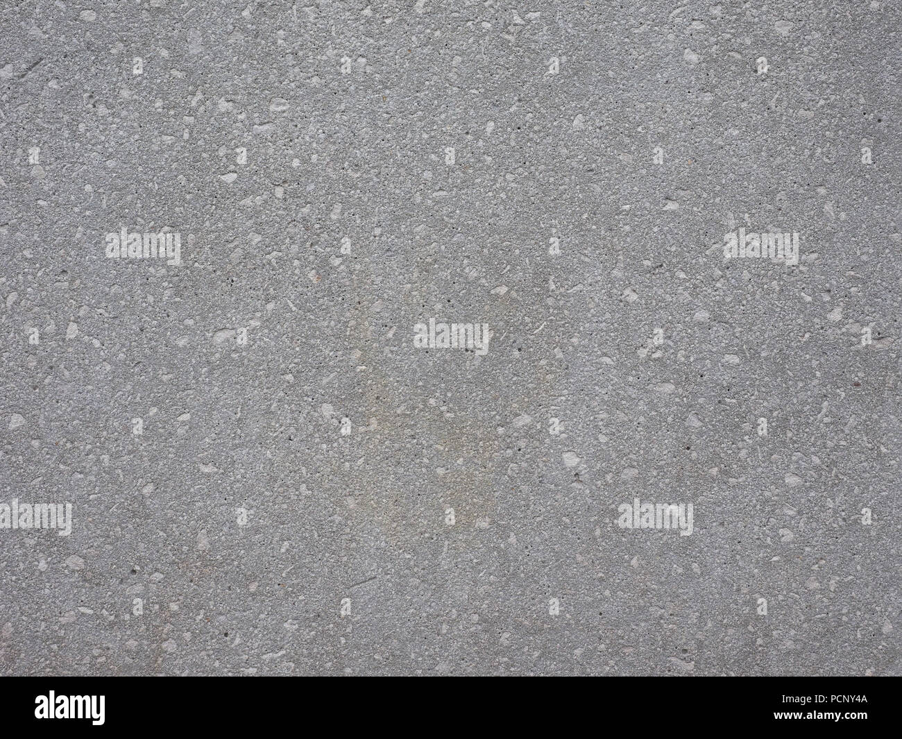 grey stone wall useful as a background Stock Photo - Alamy