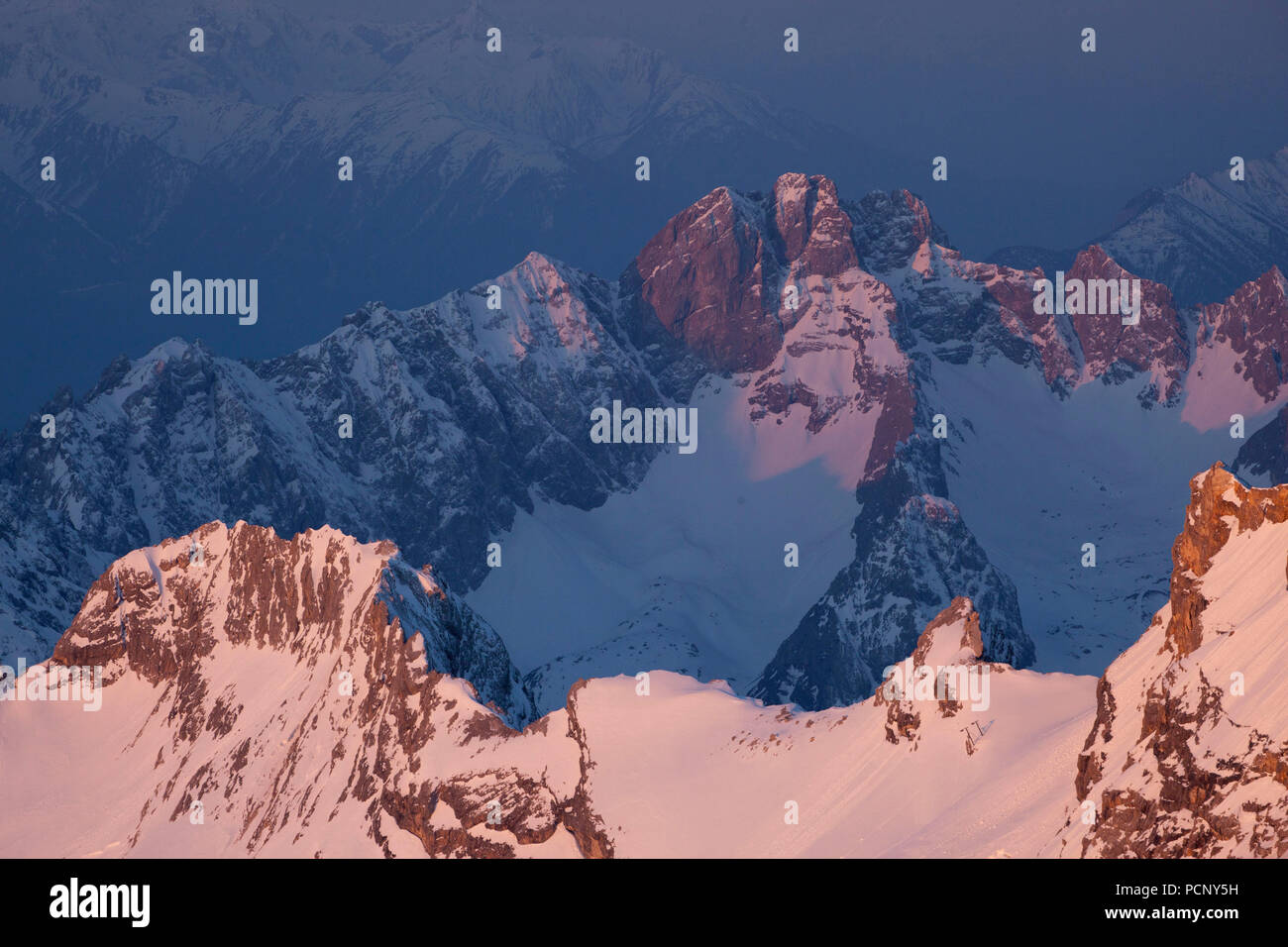 View from the Zugspitze to the Mieming Range at sunrise, Wetterstein Mountains, close Garmisch, Upper Bavaria, Bavaria, Germany Stock Photo