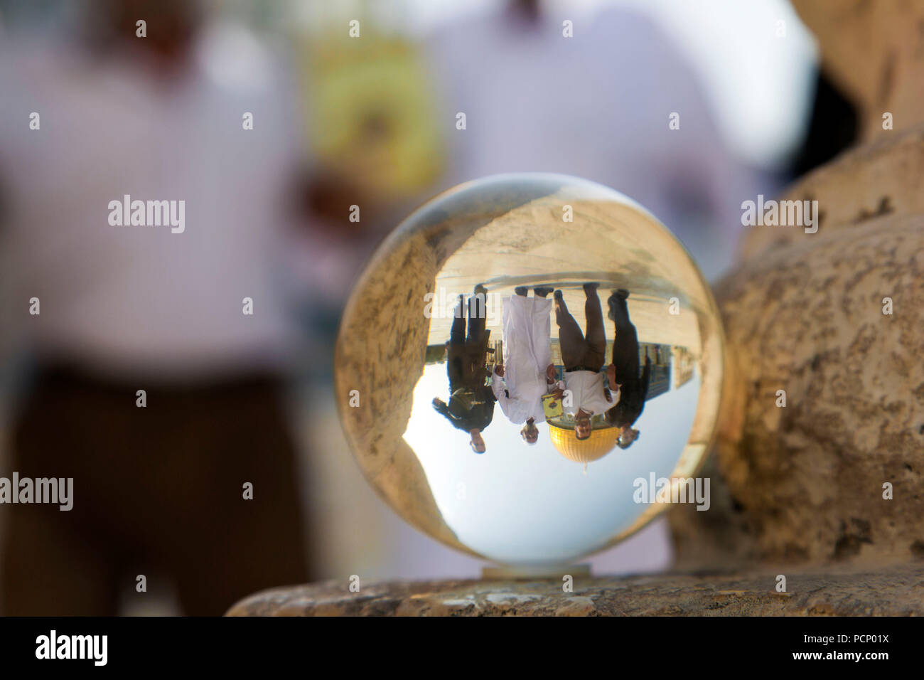 Israel, Jerusalem, Muslims under arrest in front of Dome of the Rock, in glass ball Stock Photo