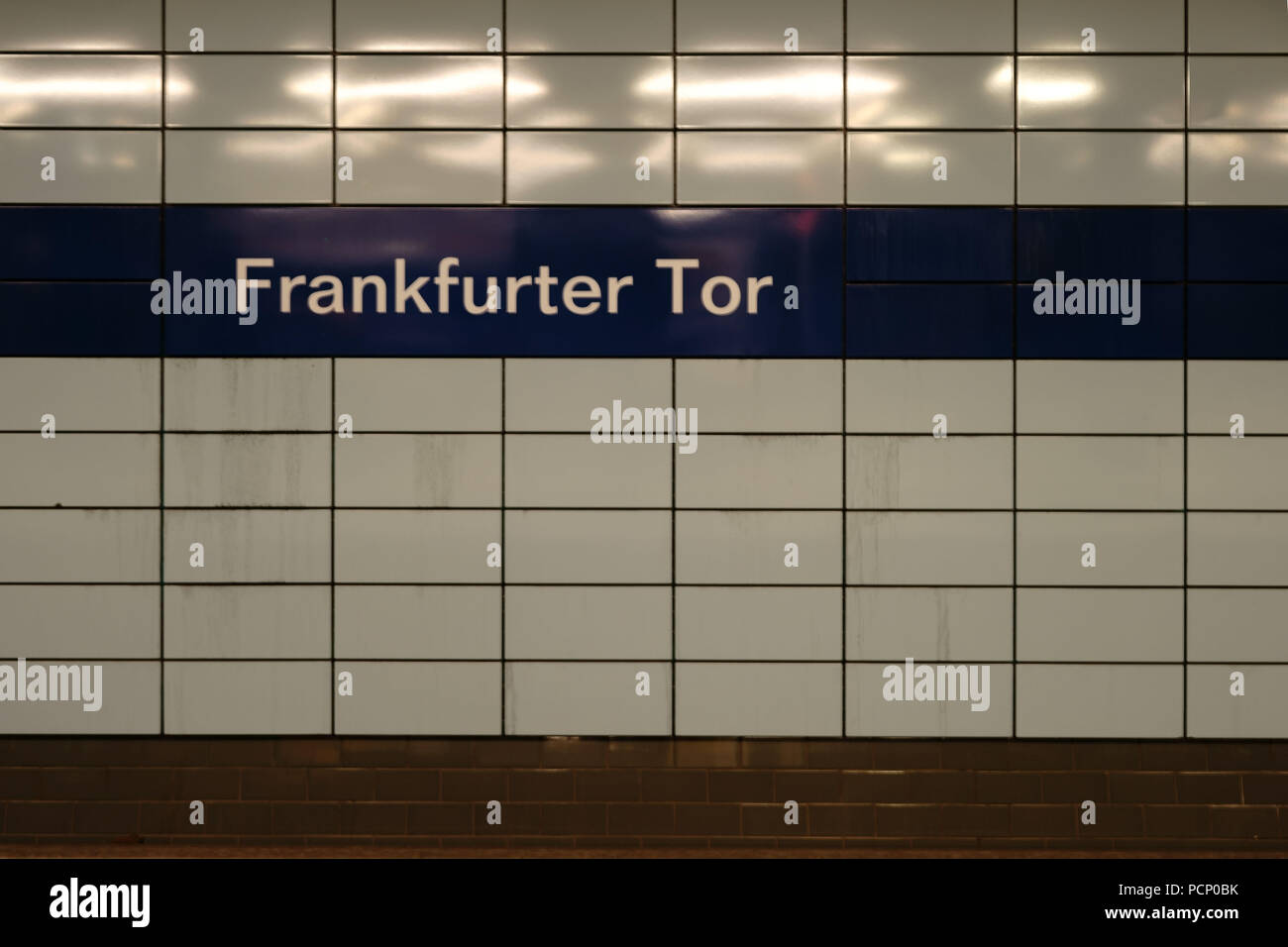 The sign of the tiled subway stop Frankfurter Tor in Berlin. Stock Photo