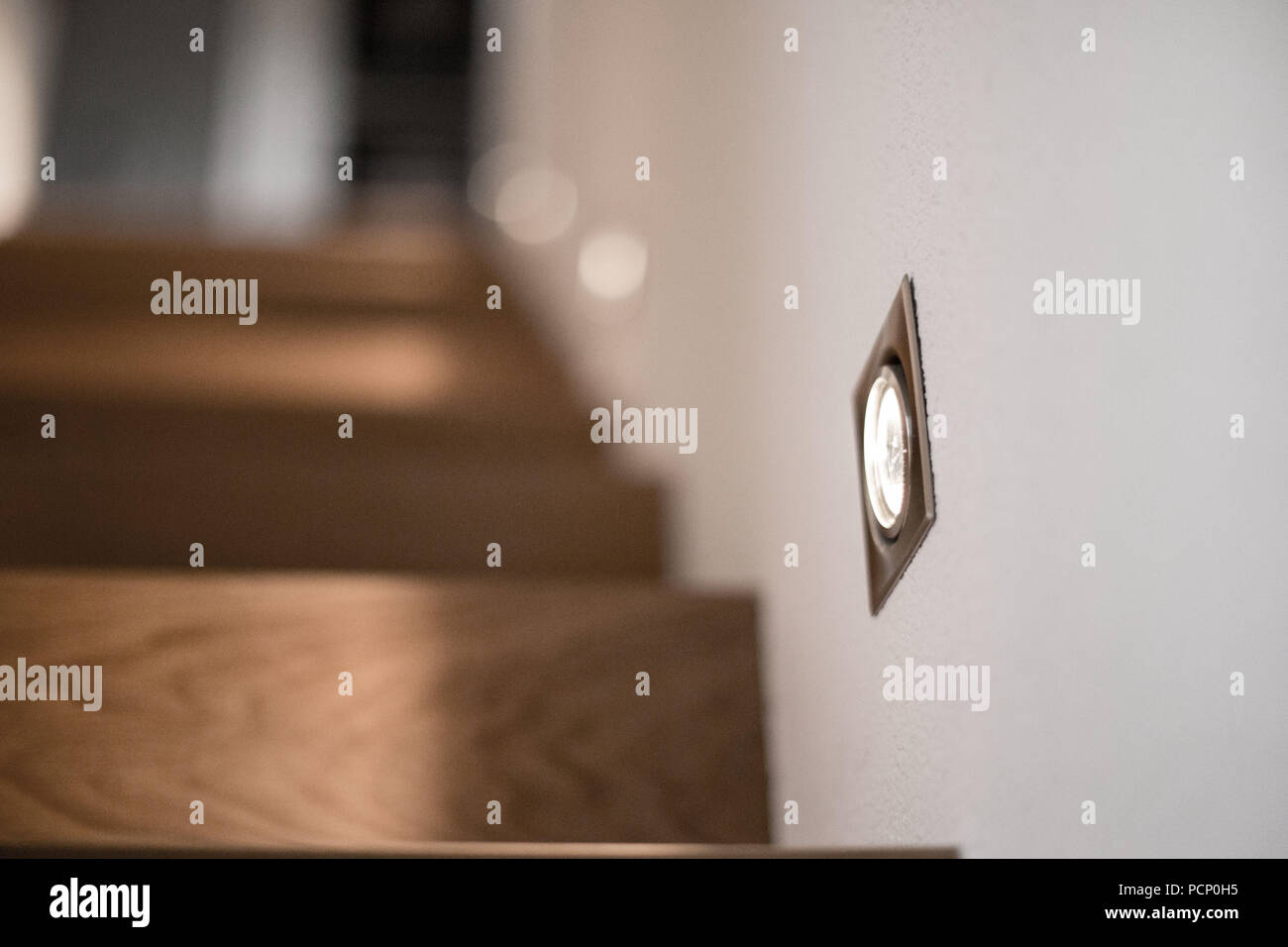 Spotlights integrated in the staircase Stock Photo