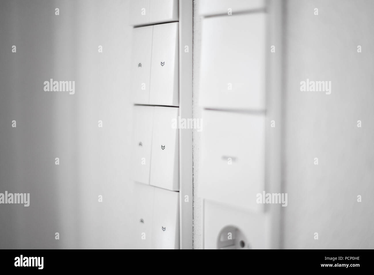 Close-up of a light switch and a shutter control Stock Photo