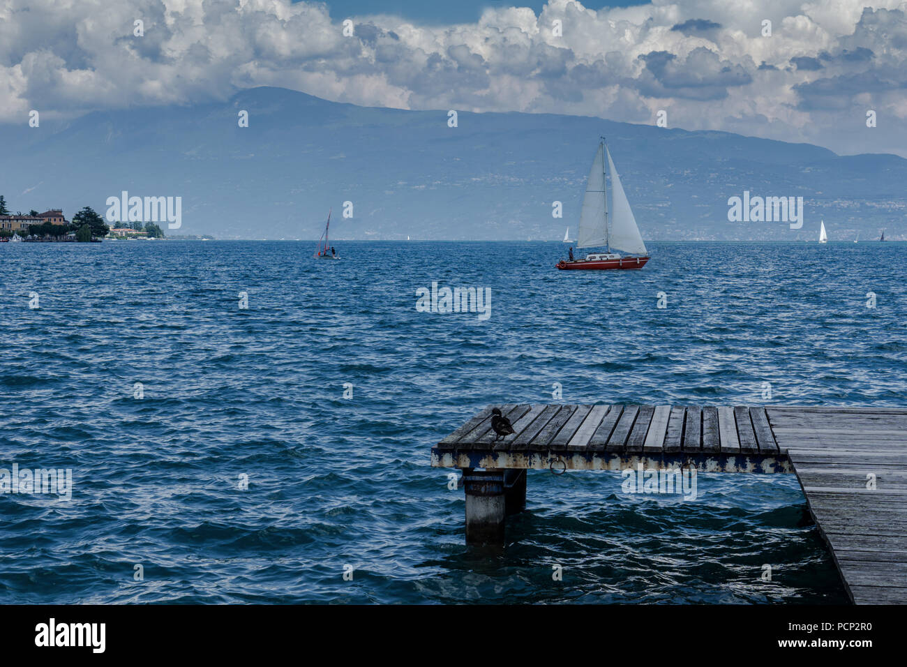 Sailing boats on Lake Garda Stock Photo Alamy