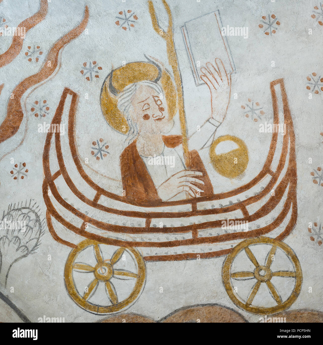 Moses with two horns in the forehead, sitting in the Ark of the Covenant,  with two weels, a medieval mural in Kirekerup, Denmark, July 3, 2018 Stock Photo