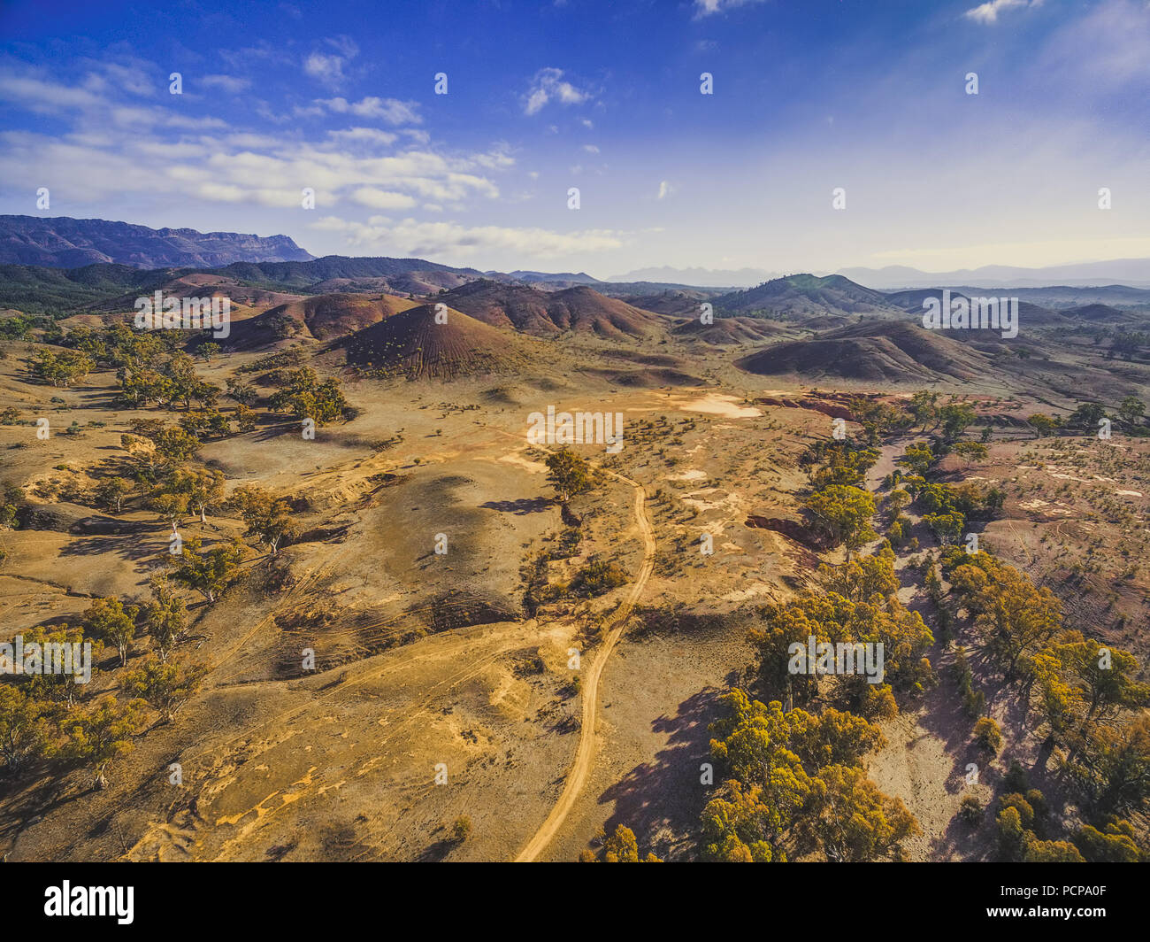 Aerial landscape Flinders Ranges mountains and rolling hills with trees in South Australia Stock Photo
