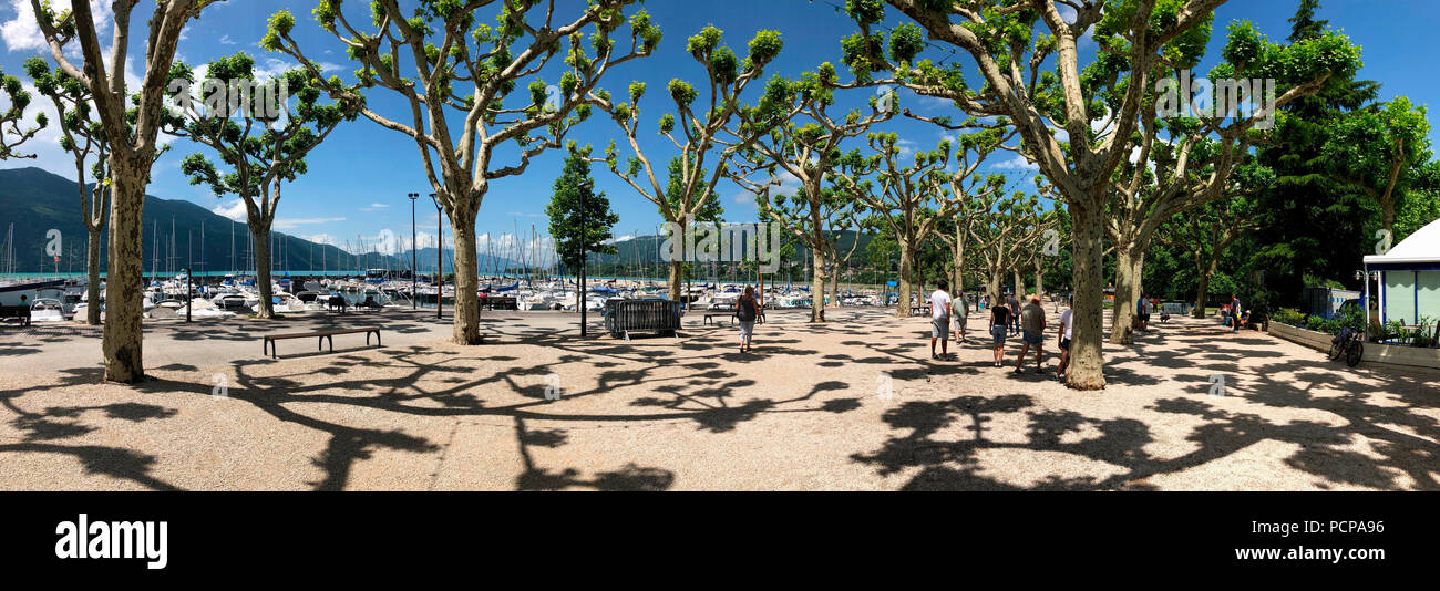 The tree lined Boulevard Du Lac at the Grand Port in the town of Aix les Bains in the Auvergne-Rhone-Alpes region in south-eastern France. On the east Stock Photo