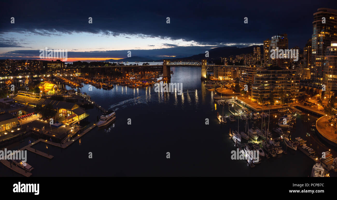 Aerial panoramic view of Downtown City during a cloudy night after ...