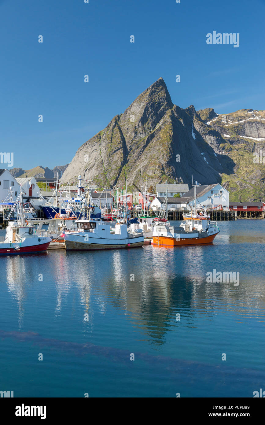 Fishing boats in Reine Harbour, Reine, Lofoten Islands, Norway Stock Photo
