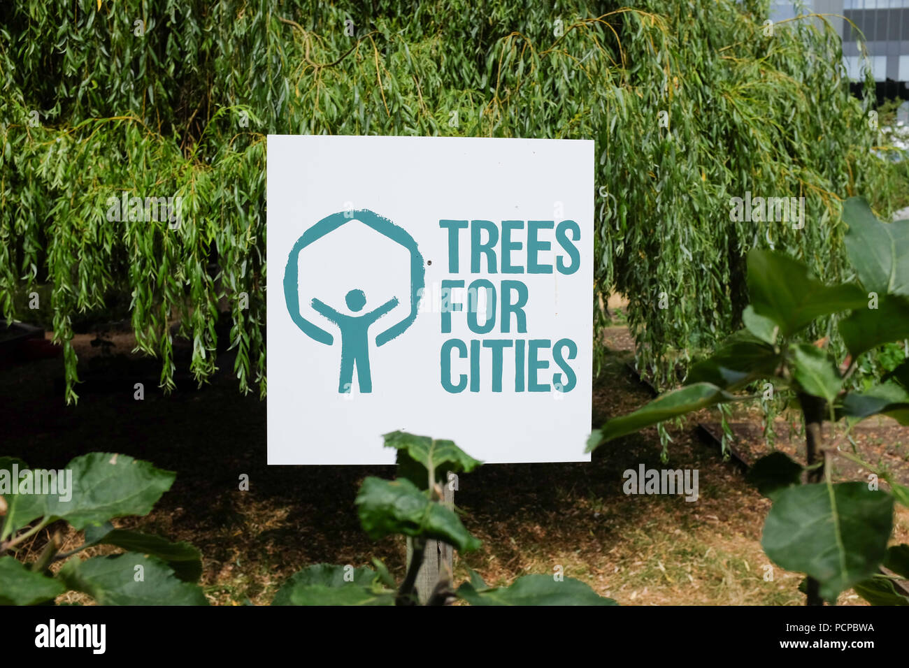 A sign for "Trees for Cities", a treeplanting charity based in the UK