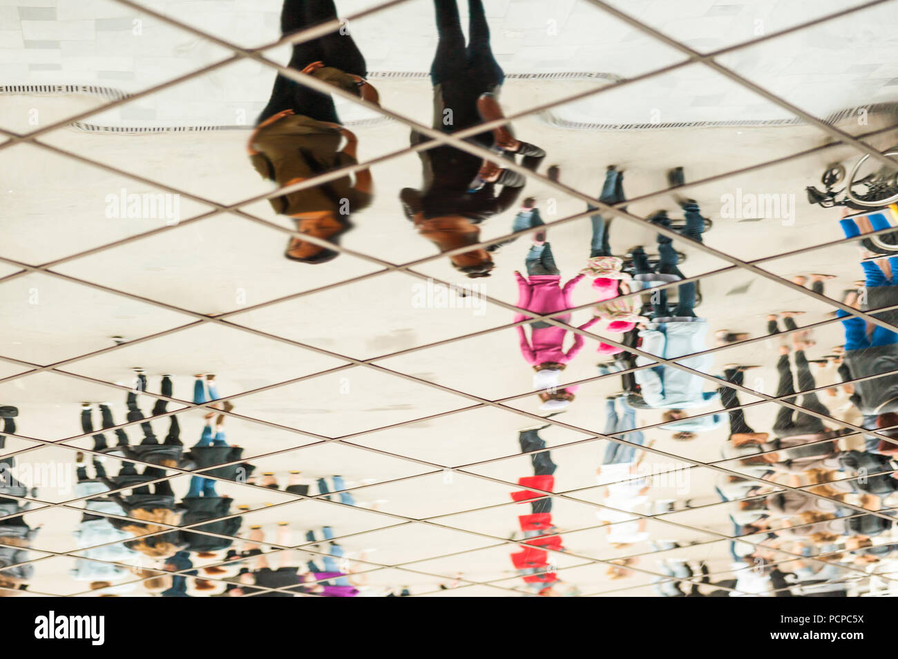 Fun house mirror at a carnival or festival at sunset. Decorative ornate