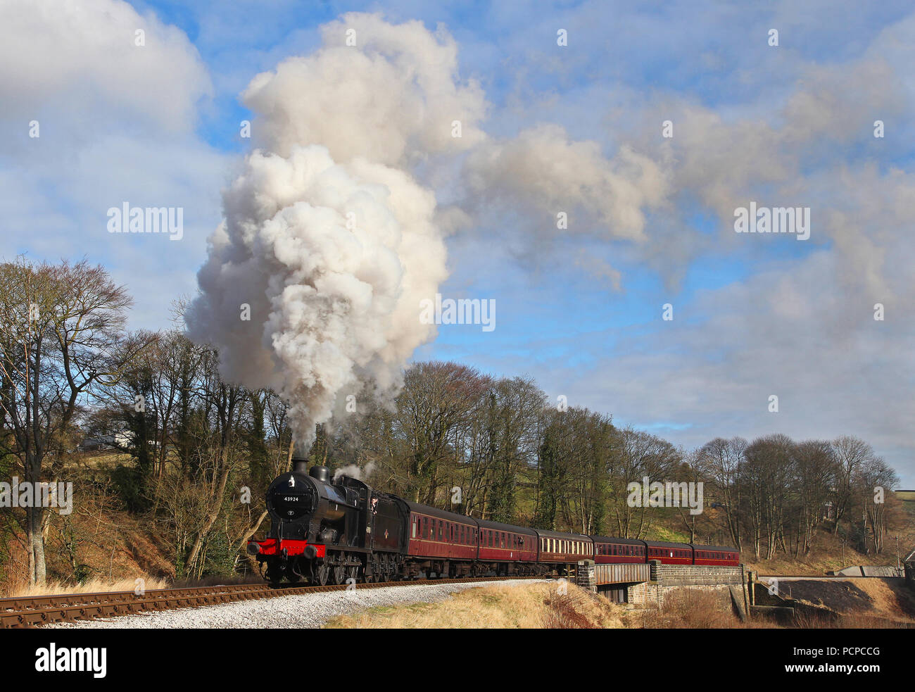 43924 heads away from Oakworth at Mytholmes during the KWVR steam Gala on 28.2.16. Stock Photo