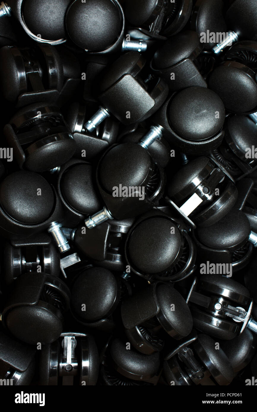 Black plastic wheel roller unit component Stock Photo