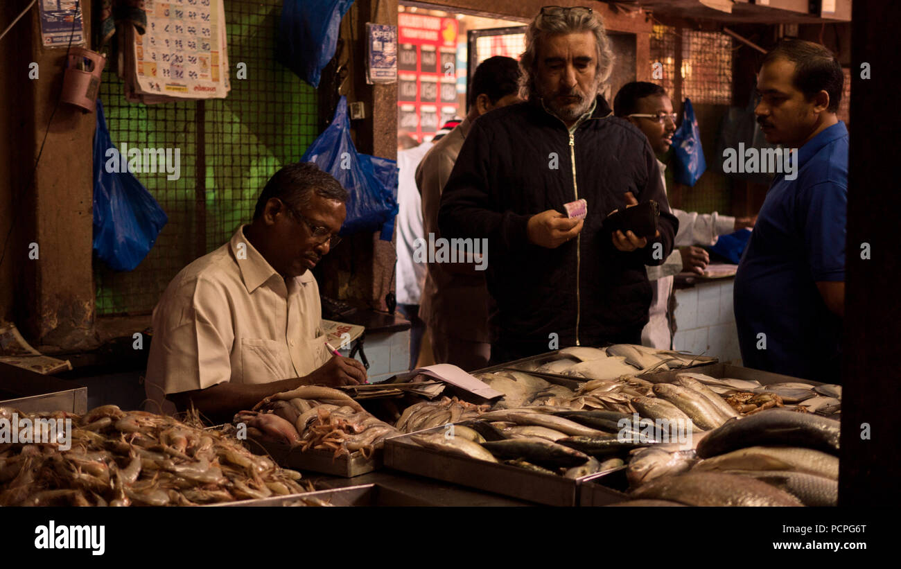 A customer surveys a fishmongers stock Stock Photo