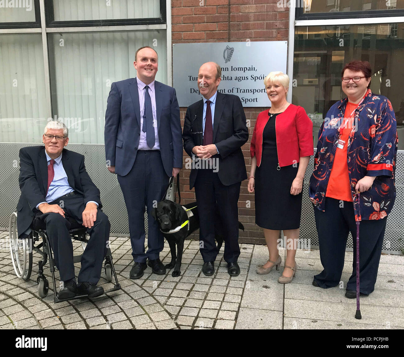 Ireland's transport Minister Shane Ross (centre) with (left to right) Liam ORourke, Kevin Kelly with guide dog Miles, Elaine Howley and Suzy Byrne at the announcement of the new appointments to public transport boards in Dublin. Stock Photo