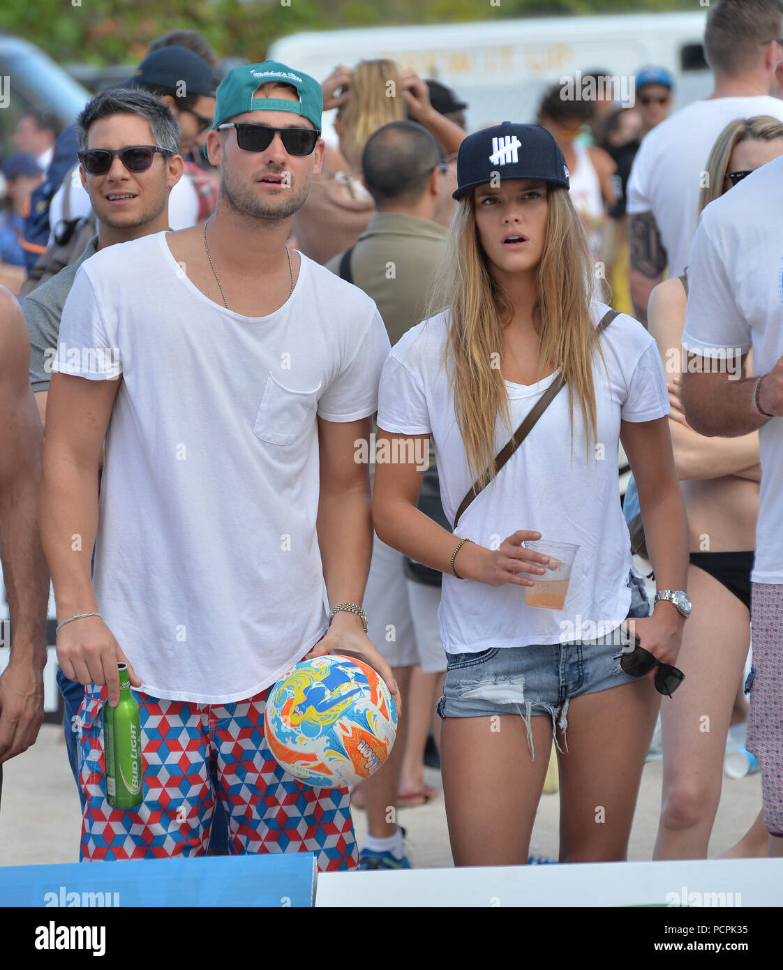 MIAMI BEACH, FL - FEBRUARY 08: Sports Illustrated cover model Nina Agdal spent the day making out with boyfriend Reid Heidenry and watching beach volley ball on February 8, 2015 in Miami Beach, Florida.  People:  Nina Agdal, Reid Heidenry Stock Photo