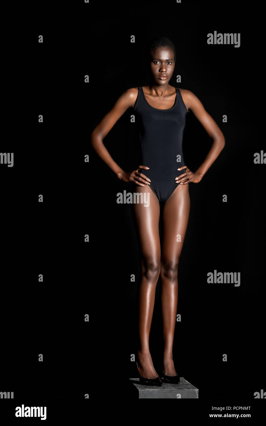 full length view of beautiful african american girl in bodysuit