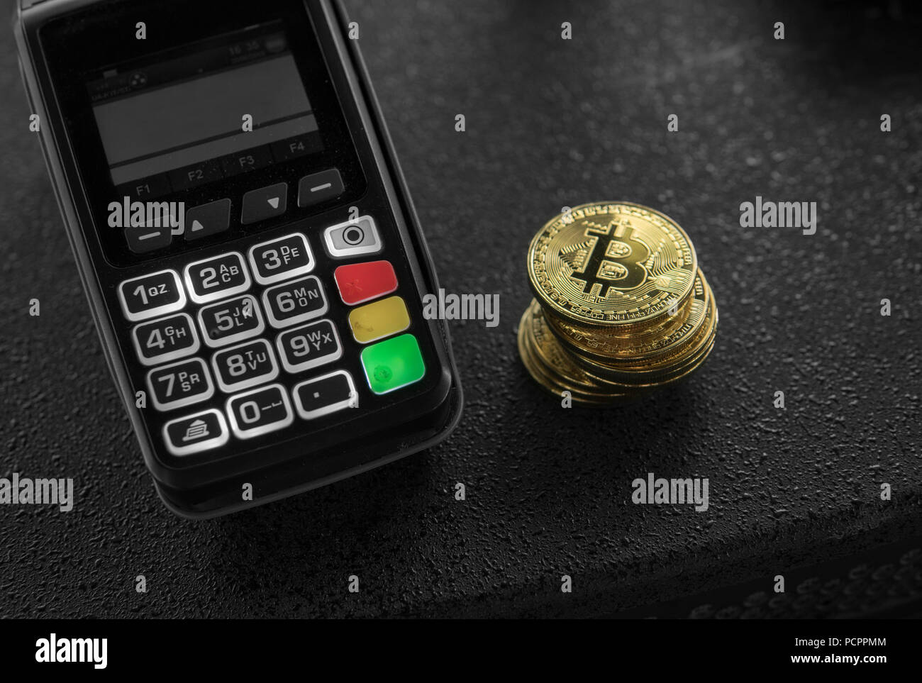 A pile of gold Bitcoin coins and POS terminal. Bitcoins Cryptocurrency.  E-commerce, business, finance concept, banking and paymant Stock Photo -  Alamy