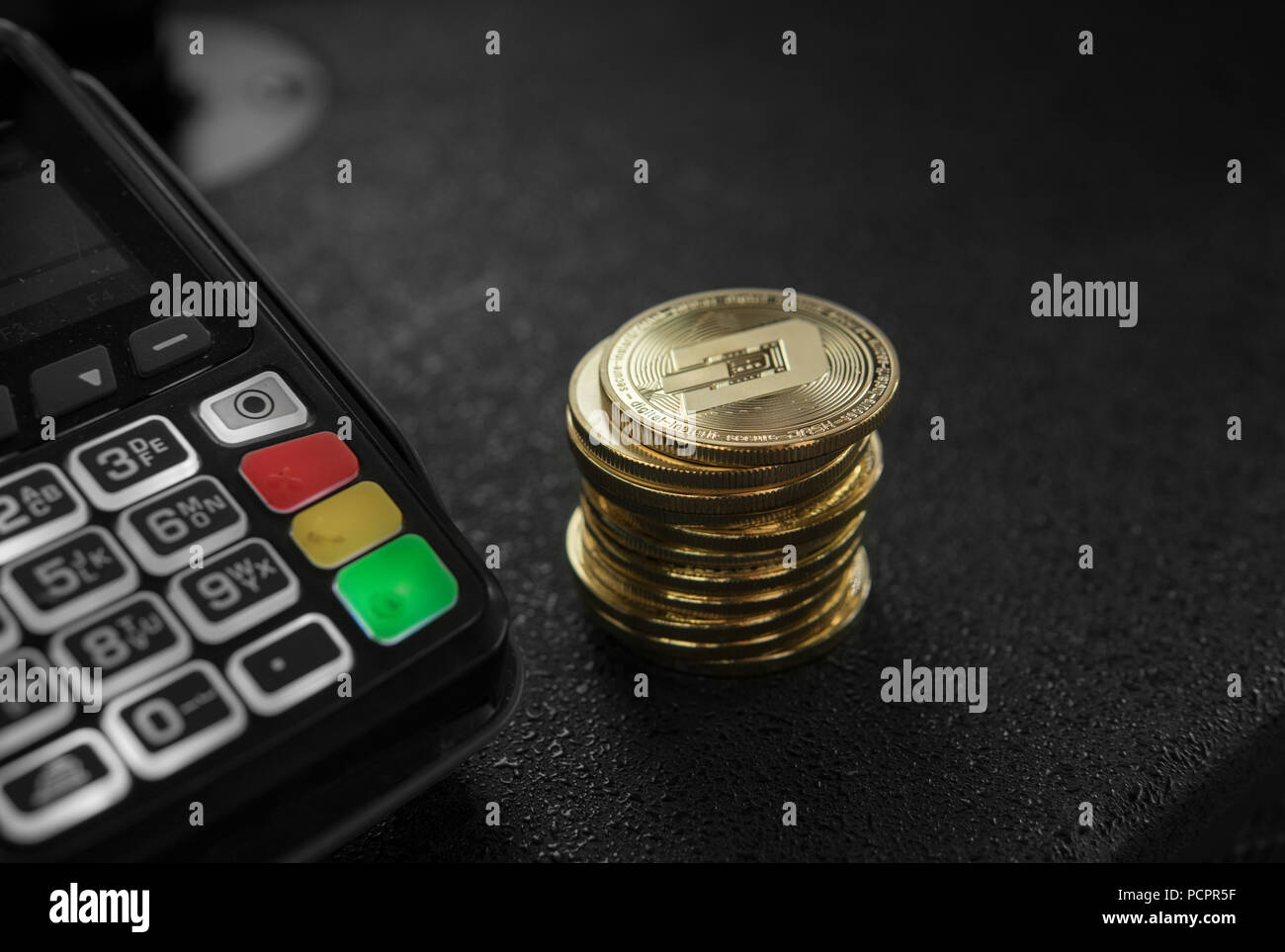 A pile of gold Dash Crypto currency coins and POS terminal. Dashes  Cryptocurrency. E-commerce, business, finance concept, banking and payment  Stock Photo - Alamy