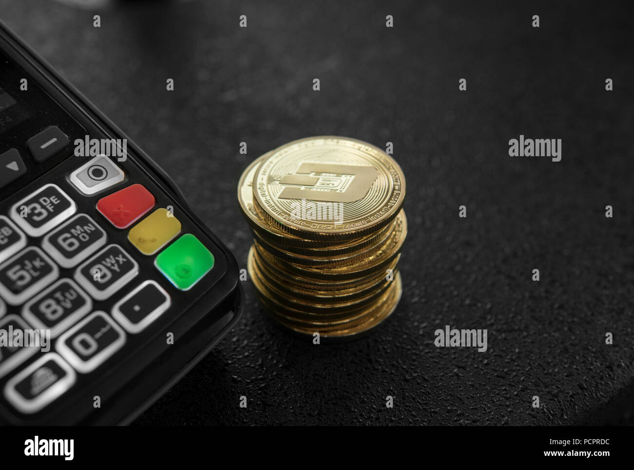 A pile of gold Dash Crypto currency coins and POS terminal. Dashes  Cryptocurrency. E-commerce, business, finance concept, banking and payment  Stock Photo - Alamy